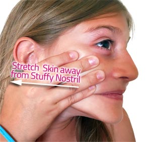Stretch Cheek To Get Rid of a Stuffy Nose